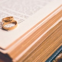 The Essence of CovenantRecently, I participated in a conversion about divorce in the church. While many attribute marital difficulties to communication or the lack thereof, I was of the opinion that a failure to understand the essence of covenant was at the heart of divorce.Covenant is word we often find when studying the Bible or discussing biblical theology. We may reference the new covenant or the old covenant. We may talk about the covenant between God and Abraham or God and 	Moses. We refer to the New Testament as being under the new covenant, but what exactly is a covenant and 	what does it mean to you in this modern age?The first thing to understand about covenant is that it was created by God to be holy. It is not to be taken lightly and should only be entered into with the full understanding of its sacred requirements.God holds the sanctity of covenant above nearly all other things. It is covenant that is at the center of our salvation through Christ. It is covenant that defines Christ’s death on the cross. It is the fulfillment of covenant that has redeemed mankind and brought him back to his creator.The English language fails us in many ways when we use it to understand scriptures. Our understanding of covenant is a good example. In Hebrew, the word for covenant means both covenant and testament. This means for us, that we may freely exchange those two English words. For example, the Old Testament and the New Testament are the old covenant and the new covenant and vice-versa.If we are to understand the essence of covenant, we need an English phrase to encompass its true meaning. The phrase "binding-agreement-upon-death" comes fairly close.In English, we separate the words covenant and testament with two separate meanings. The English definition for a covenant is an agreement. The English definition for testament is a document or a statement which commonly comes into effect upon death.This is how we come to the phrase, last will and testament. At the reading of a will, the final wishes of a deceased person is read aloud and carried out. The testament therefore becomes effective only after the person’s death. This is the critical component of a covenant – to enter into covenant, a death is required! There is no way around this. If you do not have a death, you cannot enter into covenant.When we combine these two English definitions, we come close to the essence of God’s covenant – a binding agreement that becomes effective upon death.The first time we see covenant in scripture is when God enters into covenant with Abram in Genesis Chapter 15.Gen 15:9 "And he said unto him, Take me an heifer of three years old, and a she goat of three years old, and a ram of three years old, and a turtledove, and a young pigeon."Gen 15:10 "And he took unto him all these, and divided them in the midst, and laid each piece one against another: but the birds divided he not."In verse nine, God tells Abram to gather together a heifer, a goat, and a ram. He then has Abram sacrifice the animals and cut their carcasses into two halves by dividing them.Later in verses 17-18 we see the Spirit of God pass between the animal carcass halves and enter into a covenant with Abram.Gen 15:17 "And it came to pass, that, when the sun went down, and it was dark, behold a smoking furnace, and a burning lamp that passed between those pieces."Gen 15:18  "In the same day the LORD made a covenant with Abram, saying, Unto thy seed have I given this land, from the river of Egypt unto the great river, the river Euphrates:"What we’re seeing in these verses is the creation of covenant. By passing between the halves of the sacrificed animals, God has "sealed" His agreement with Abram with death. That is the essence of covenant – a binding agreement upon death.We see this act of covenant again when God asks Abraham to sacrifice his son Isaac. Though God stays Abraham’s hand at the last second, in his heart Abraham fulfilled his responsibility to God by sacrificing his son. Upon this act, Abraham entered into a new covenant with God.God fulfills His responsibility to this new covenant with Abraham by sacrificing His son Jesus on the cross. Upon Jesus’ death, the new covenant or New Testament goes into effect. Again, we see that a covenant is a binding agreement upon death.The application of a covenant is a solemn and holy act in which God places great importance. Throughout the history of the nation of Israel, God holds the sanctity of covenant above all other agreements and considers the breaking of covenant one of the greatest sins. When did God unleash His wrath upon Israel? When she broke her covenant with God and worshiped false gods and idols.The covenant between God and Israel is like a spiritual marriage. The new covenant is like a marriage too with Jesus as the bride groom and the church as the bride. A marriage between a man and woman is a mirror image of God’s covenant and so, marriage is much more than just vows. It is a holy commitment that binds two people in a covenant that becomes effective upon death, but what death? – the death of self.The essence of covenant in marriage is to give up your life, or to die to yourself, so that your life becomes your spouses’. From the moment you enter into a covenant of marriage, your life is no longer yours but now belongs to your spouse for you have died to yourself. This is the death that seals a marriage in covenant.While I agree with those that say communication is important to a marriage, I believe it is a failure to understand the essence of covenant that is at the heart of the divorce rate we see in the church.