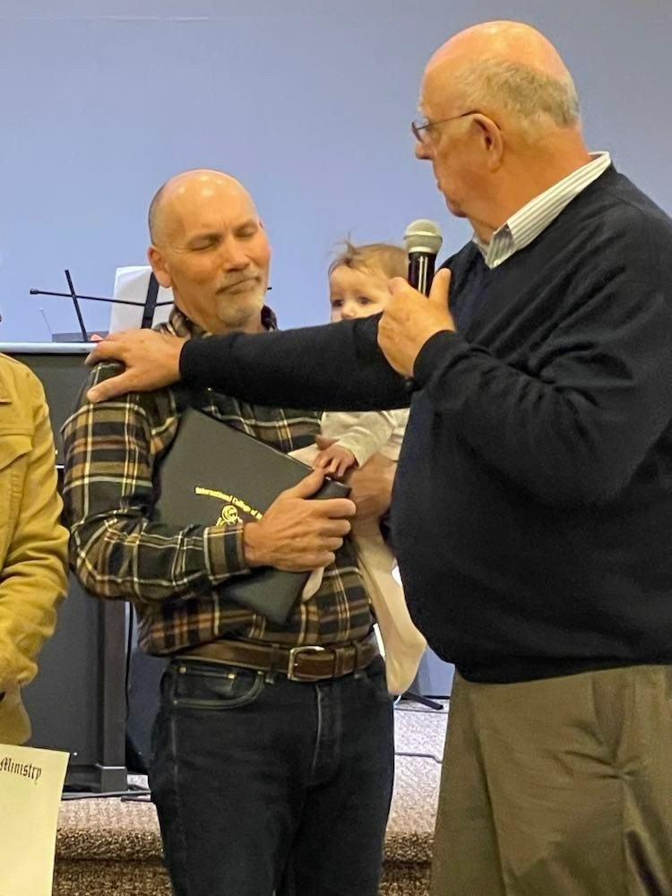 This past Sunday at Whole Life Church in Sturgis, MI, some our recent graduates, Josh Vizhum and Russ Stauffer, both had their Bachelor of Arts in Ministry degrees conferred by Dr. Self. Let's congratulate them!